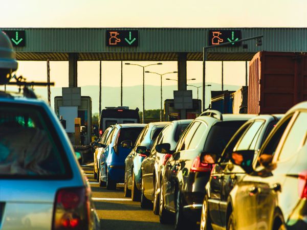 Cars lined up to pay road toll