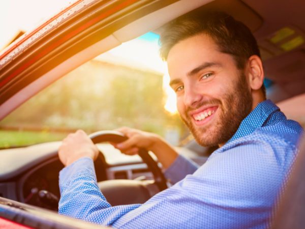 Man Driving a Rental Car
